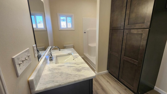 357 Taylor Rd, Byrdstown, TN 38549 - full bathroom featuring vanity and wood finished floors
