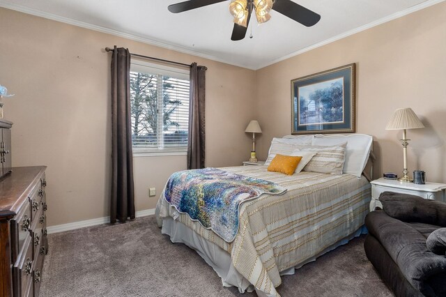 carpeted bedroom with baseboards, a ceiling fan, and ornamental molding