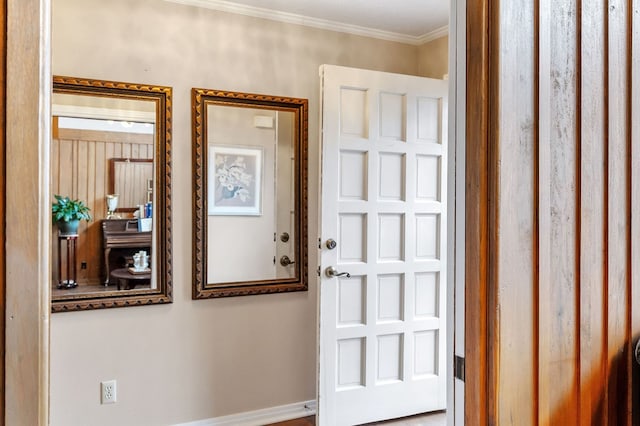 entryway featuring ornamental molding