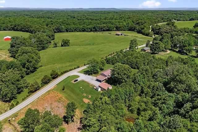 aerial view featuring a view of trees