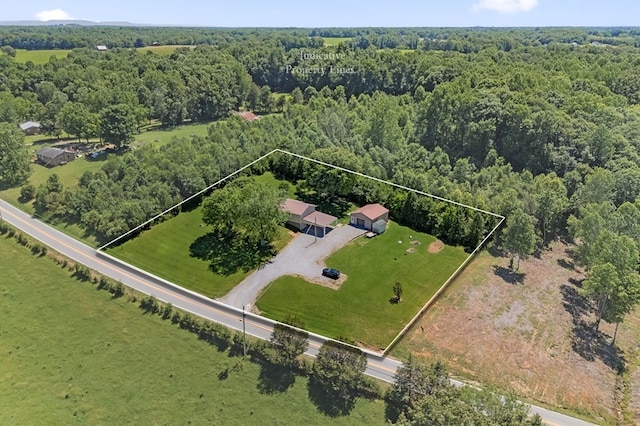 bird's eye view with a forest view