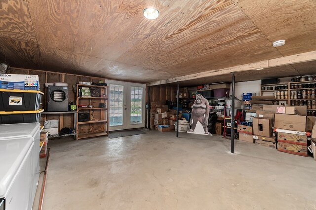 interior space featuring washer and clothes dryer and french doors