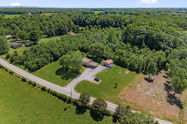 bird's eye view featuring a view of trees