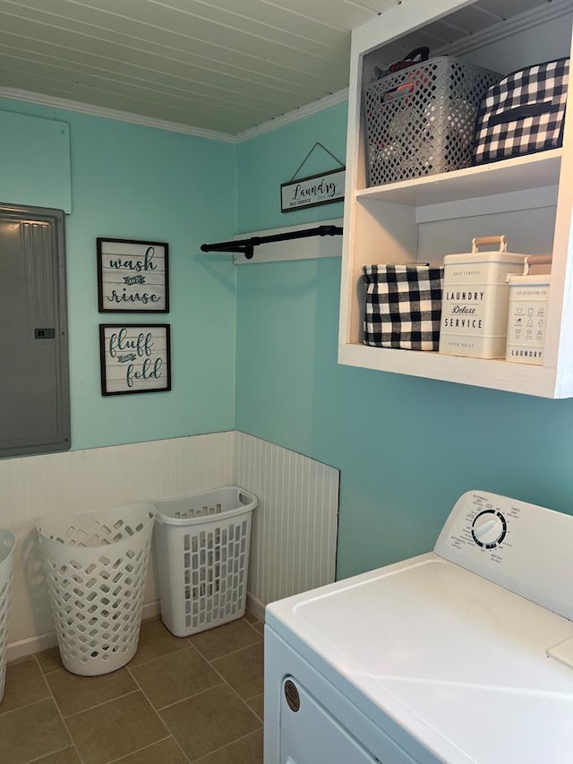 washroom featuring electric panel, washer / clothes dryer, ornamental molding, and laundry area