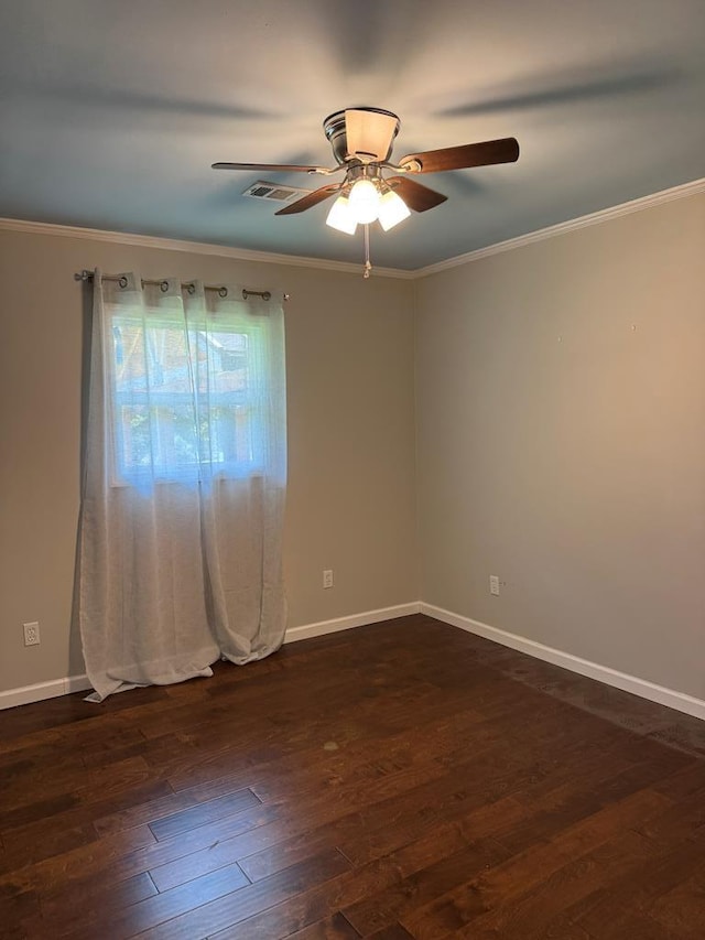 8298 Southfork Rd, Baxter, TN 38544 - spare room featuring a ceiling fan, dark wood finished floors, and ornamental molding