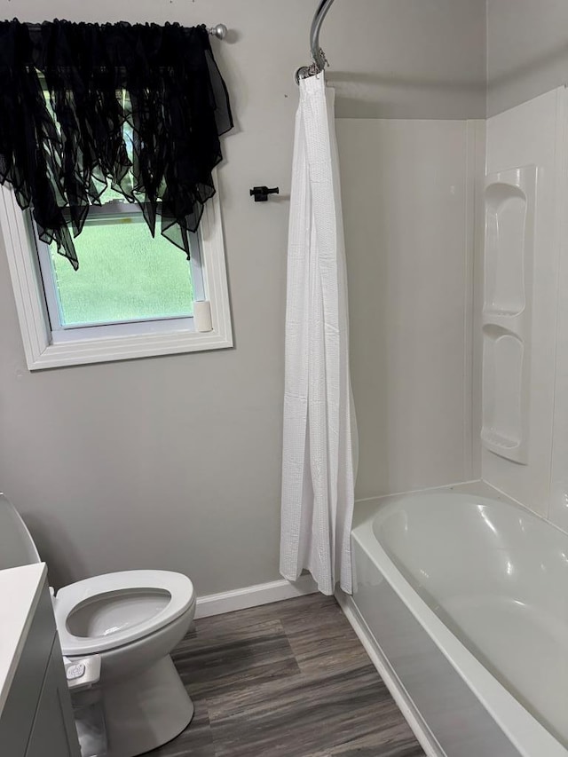 8298 Southfork Rd, Baxter, TN 38544 - full bathroom featuring vanity, shower / bath combination with curtain, and wood finished floors