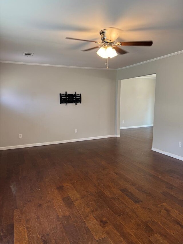 8298 Southfork Rd, Baxter, TN 38544 - empty room with ornamental molding, ceiling fan, and dark wood-style flooring