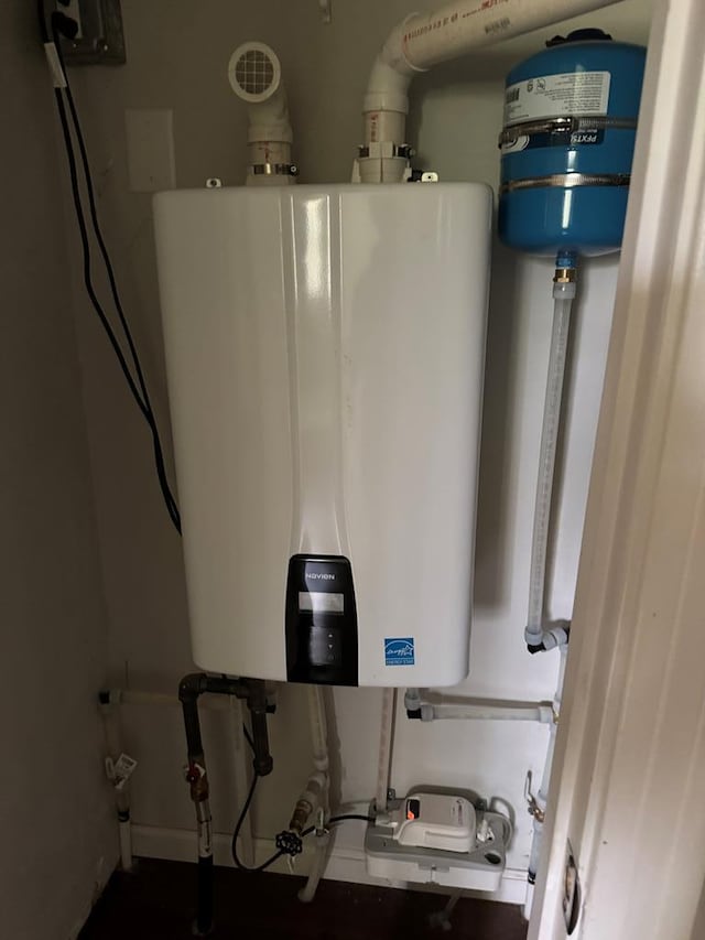 8298 Southfork Rd, Baxter, TN 38544 - utility room featuring tankless water heater