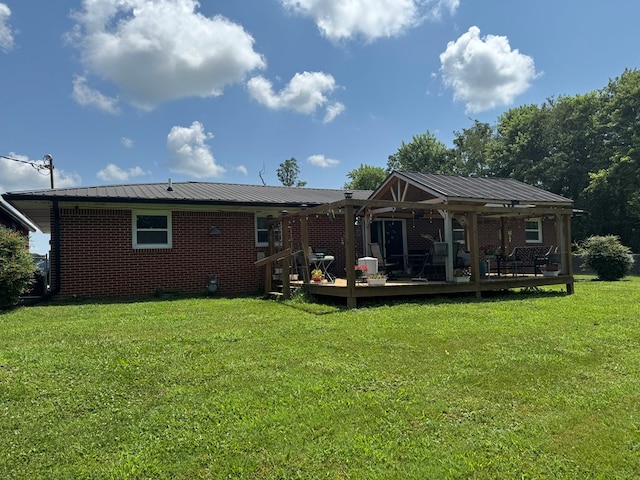 8298 Southfork Rd, Baxter, TN 38544 - back of property featuring a yard, a deck, a metal roof, and a gazebo