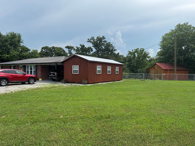 8298 Southfork Rd, Baxter, TN 38544 - view of side of home featuring a carport and a metal roof