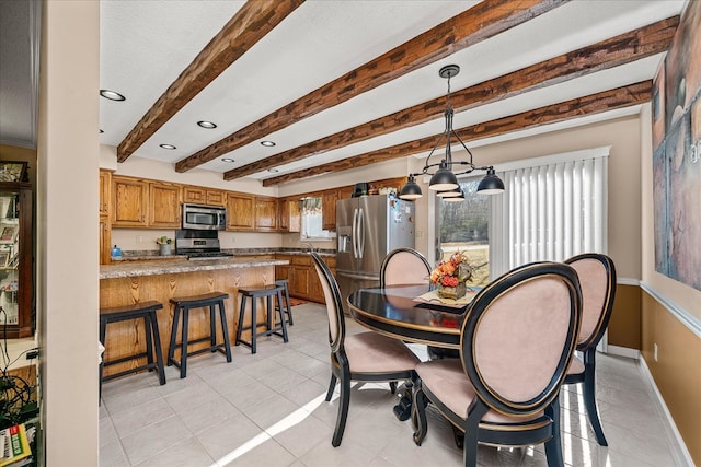 dining room featuring a textured ceiling, baseboards, beam ceiling, and light tile patterned flooring