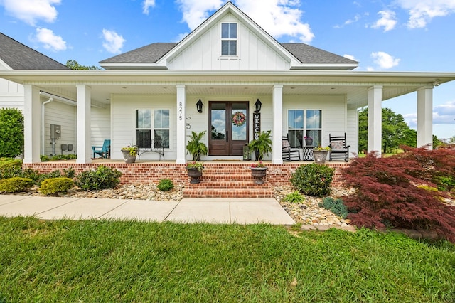 8275 Medlin Rd, Baxter, TN 38544 - view of front of house featuring covered porch, board and batten siding, and a shingled roof