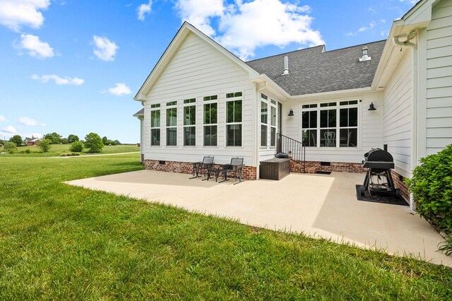 8275 Medlin Rd, Baxter, TN 38544 - rear view of property with crawl space, a patio, a yard, and roof with shingles