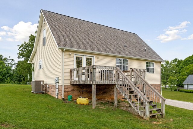 1841 SW Jones Chapel Rd, Byrdstown, TN 38549 - back of property featuring central AC, a wooden deck, a lawn, and roof with shingles