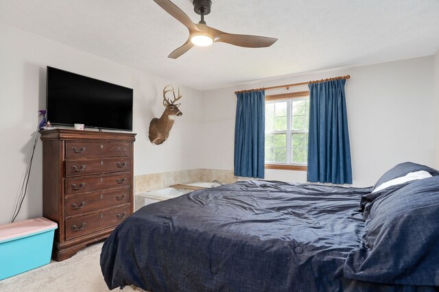 1841 SW Jones Chapel Rd, Byrdstown, TN 38549 - bedroom featuring light colored carpet and ceiling fan