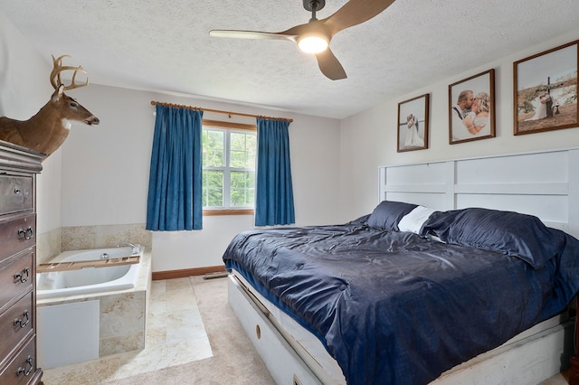 1841 SW Jones Chapel Rd, Byrdstown, TN 38549 - bedroom featuring a textured ceiling, ceiling fan, light colored carpet, and baseboards