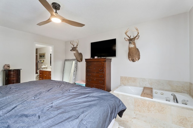 1841 SW Jones Chapel Rd, Byrdstown, TN 38549 - bedroom with ceiling fan and connected bathroom