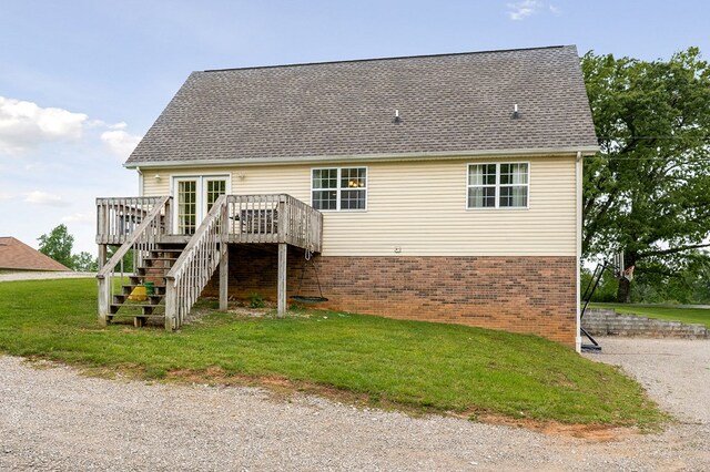 1841 SW Jones Chapel Rd, Byrdstown, TN 38549 - back of house with a deck, stairs, brick siding, and a lawn
