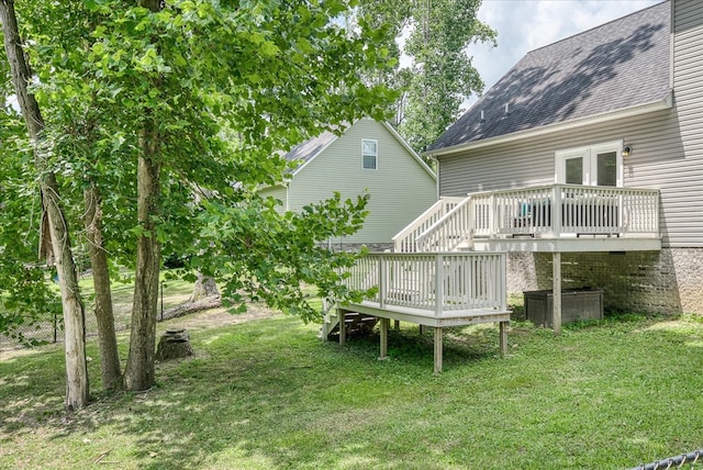 139 Rachelle Pl, Baxter, TN 38544 - rear view of property featuring a shingled roof, a wooden deck, a yard, and french doors