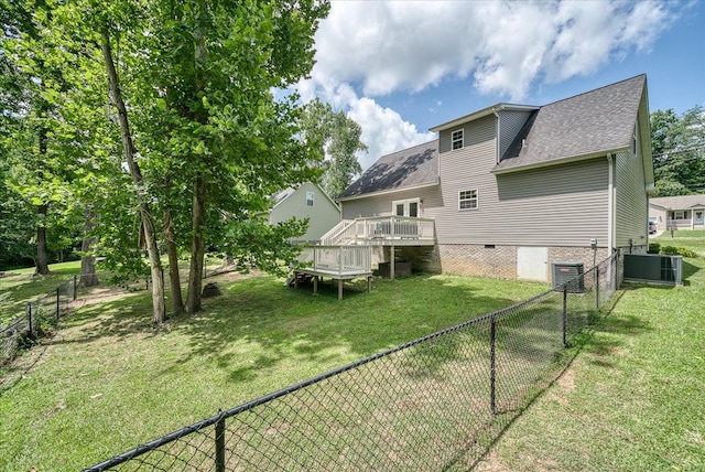 139 Rachelle Pl, Baxter, TN 38544 - rear view of property featuring a deck, a fenced backyard, and roof with shingles