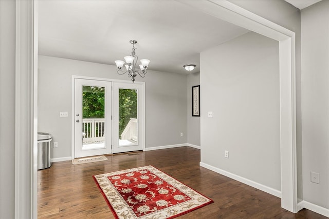 139 Rachelle Pl, Baxter, TN 38544 - unfurnished dining area featuring a chandelier and wood finished floors