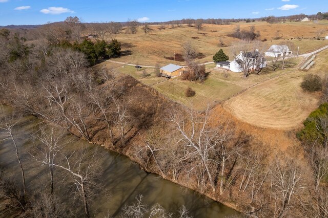 bird's eye view featuring a rural view and a water view