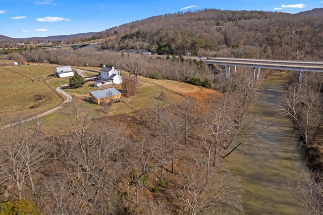 drone / aerial view featuring a mountain view