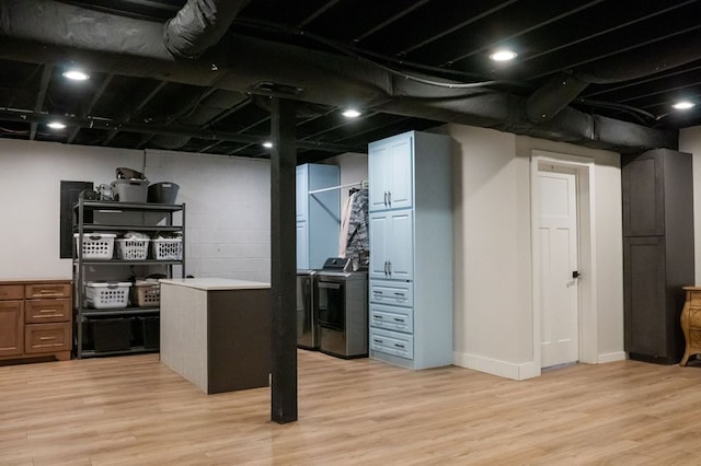 5414 Doubleview Cir, Baxter, TN 38544 - finished below grade area featuring washer and dryer and light wood-type flooring