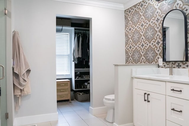5414 Doubleview Cir, Baxter, TN 38544 - bathroom featuring ornamental molding, vanity, tile patterned flooring, a stall shower, and a spacious closet