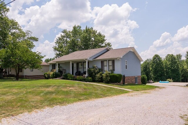 5414 Doubleview Cir, Baxter, TN 38544 - ranch-style house featuring a front lawn, covered porch, and driveway