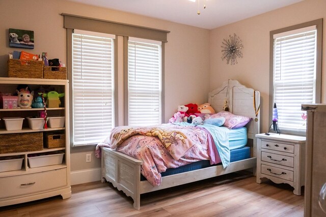 5414 Doubleview Cir, Baxter, TN 38544 - bedroom with light wood-type flooring and baseboards