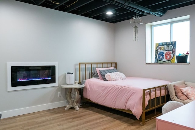 5414 Doubleview Cir, Baxter, TN 38544 - bedroom featuring light wood-style flooring and baseboards