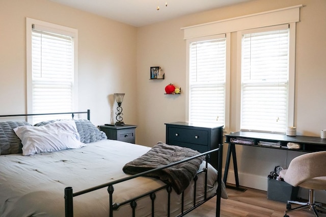 5414 Doubleview Cir, Baxter, TN 38544 - bedroom with wood finished floors and baseboards
