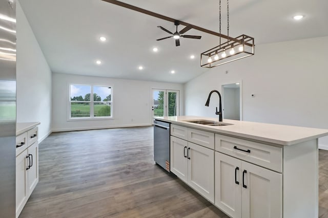 819 Hack Beaty Rd, Grimsley, TN 38565 - kitchen featuring stainless steel dishwasher, vaulted ceiling, recessed lighting, a ceiling fan, and wood finished floors