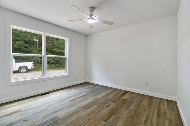 819 Hack Beaty Rd, Grimsley, TN 38565 - spare room with wood finished floors and a ceiling fan