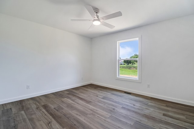 819 Hack Beaty Rd, Grimsley, TN 38565 - spare room featuring dark wood finished floors and ceiling fan