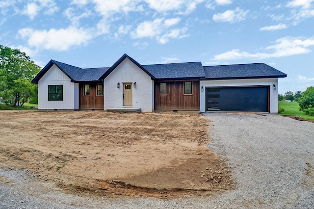 819 Hack Beaty Rd, Grimsley, TN 38565 - view of front facade with crawl space, gravel driveway, a garage, and a shingled roof
