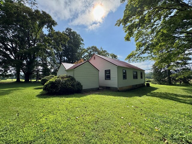 46326 US-127 S, Pikeville, TN 37367 - view of property exterior featuring a yard and a metal roof