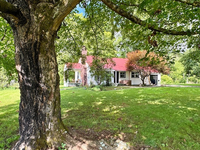46326 US-127 S, Pikeville, TN 37367 - view of front of house with a chimney and a front lawn
