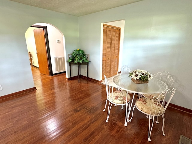 46326 US-127 S, Pikeville, TN 37367 - dining room with arched walkways, wood finished floors, and a textured ceiling