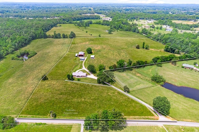 birds eye view of property with a water view and a rural view