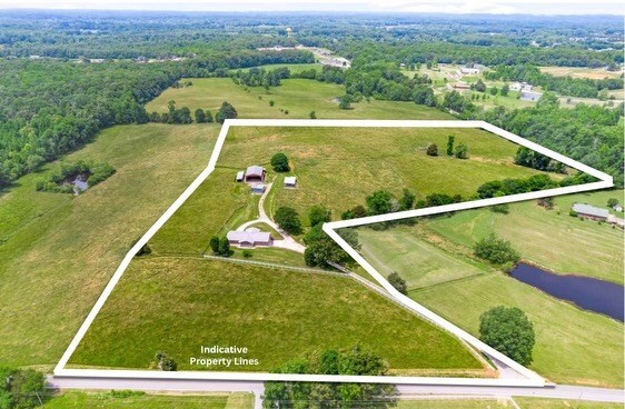 bird's eye view with a rural view and a water view