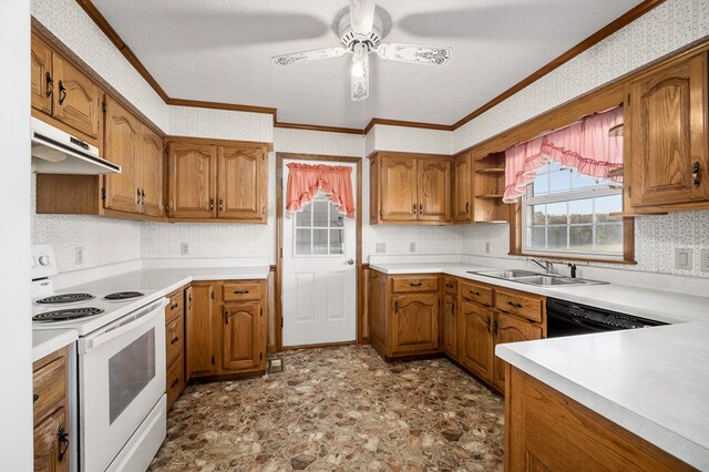 kitchen featuring white electric range oven, light countertops, brown cabinetry, a sink, and wallpapered walls