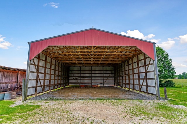 view of outdoor structure with an outbuilding and a detached carport