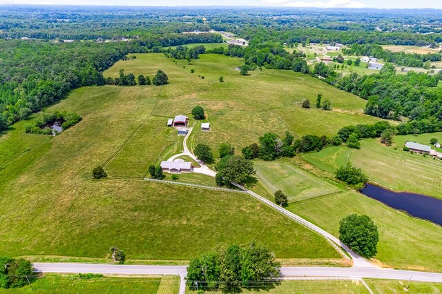 bird's eye view featuring a water view and a rural view