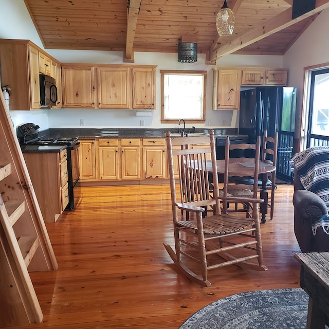 349 Treva Ln, Monterey, TN 38574 - kitchen featuring black appliances, wood ceiling, plenty of natural light, light brown cabinets, and dark countertops