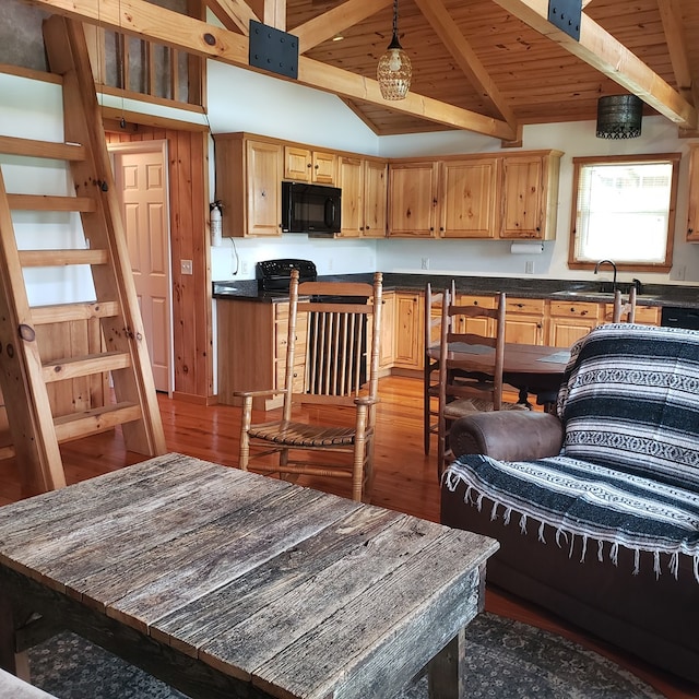 349 Treva Ln, Monterey, TN 38574 - kitchen with black appliances, wood finished floors, dark countertops, wooden ceiling, and hanging light fixtures