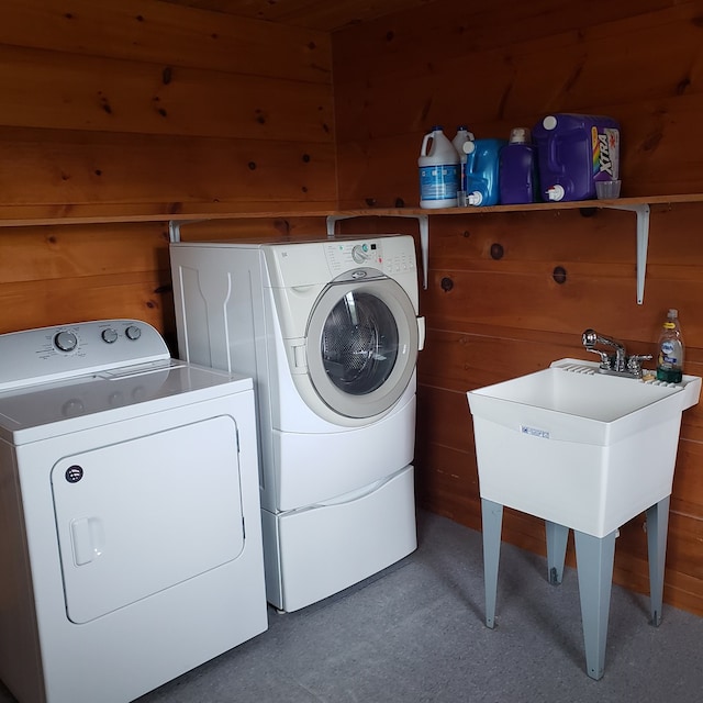 349 Treva Ln, Monterey, TN 38574 - laundry area featuring washing machine and dryer and wood walls