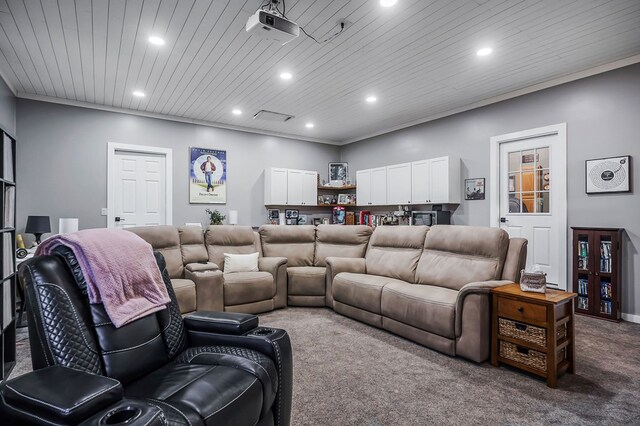 carpeted home theater featuring wooden ceiling and recessed lighting