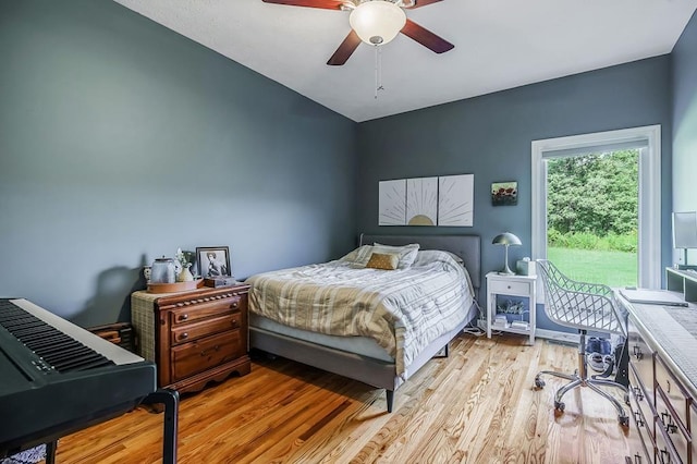 bedroom featuring light wood-type flooring and a ceiling fan